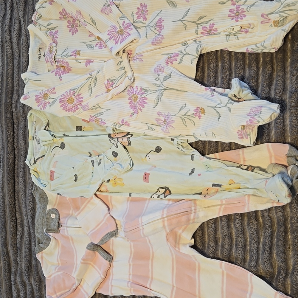 Great conditiom 0-3 onsies. Super cute mix of patterns.